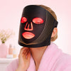Glowra™ LED Light Therapy Mask FM-02 worn on face - red light anti-aging treatment